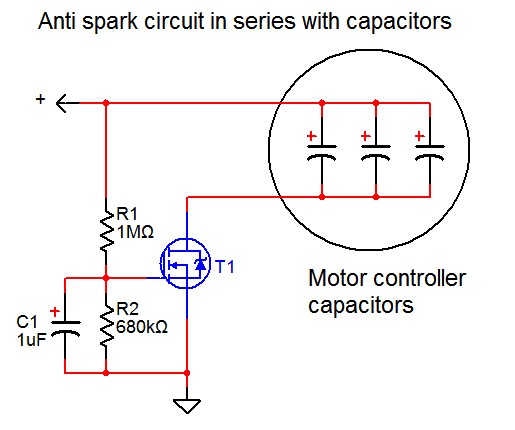 Anti spark circuit in series with capacitors